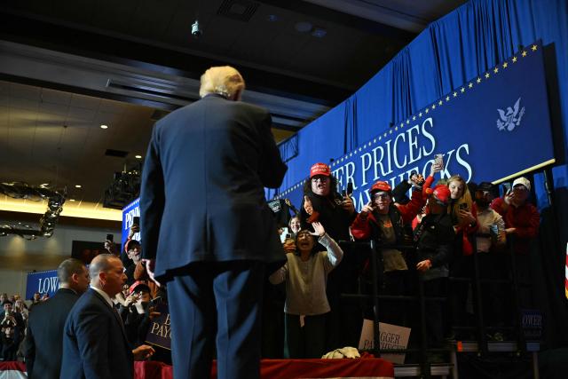 US President Donald Trump interacts with attendees after he delivered remarks on the economy at Mount Airy Casino Resort in Mount Pocono, Pennsylvania, on December 9, 2025. (Photo by ANDREW CABALLERO-REYNOLDS / AFP)