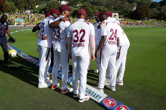 The West Indies' players prepare to walk onto the field at the start of the New Zealand innings during day one of the 2nd international Test cricket match between New Zealand and West Indies at the Basin reserve in Wellington on December 10, 2025. (Photo by Marty MELVILLE / AFP)