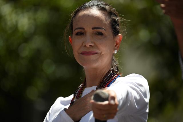 (FILES) Venezuelan opposition leader Maria Corina Machado gestures during a demonstration to protest over the presidential election results, in Caracas on August 3, 2024. The director of the Nobel institute said on December 10, 2025, he was not aware where Venezuelan opposition leader Maria Corina Machado was after it was announced she would not attend the award of her Nobel Peace Prize. (Photo by Federico PARRA / AFP)