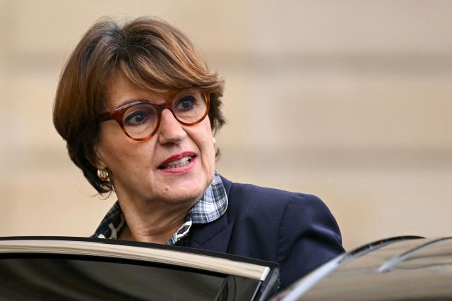 France's Agriculture Minister Annie Genevard leaves the Elysee Palace after the weekly cabinet meeting, in Paris on December 10, 2025. (Photo by Bertrand GUAY / AFP)