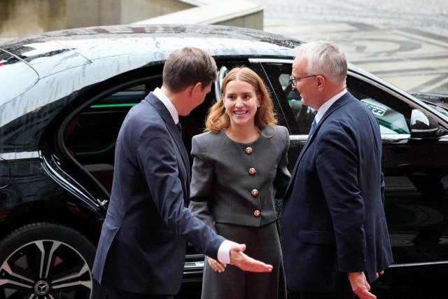 Ana Corina Sosa (C), daughter of Venezuelan opposition leader Maria Corina Machado, arrives at the Nobel Peace Prize ceremony at Oslo City Hall on December 10, 2025 in Oslo, Norway. The 2025 Nobel Peace Prize was awarded to Machado for her efforts to bring democracy to Venezuela, challenging the iron-fisted rule of Venezuelan President Nicolas Maduro, who has been president since 2013. (Photo by Gorm Kallestad / NTB / AFP) / Norway OUT