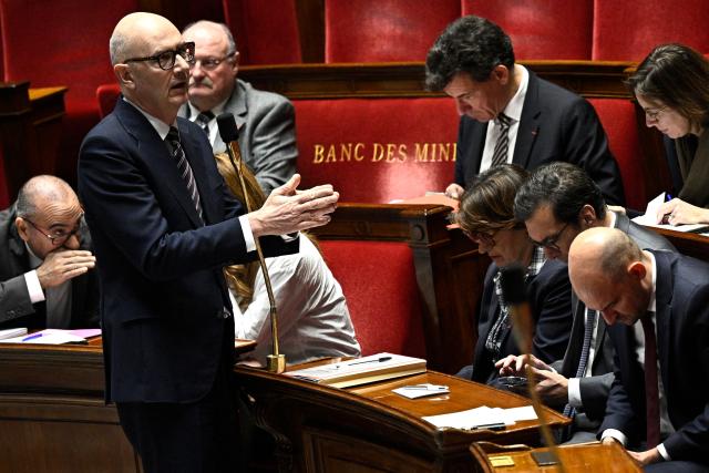 France's Economy and Finance Minister Roland Lescure answers during a session of questions to the government at the National Assembly, France's lower house parliament, in Paris on December 10, 2025. (Photo by JULIEN DE ROSA / AFP)