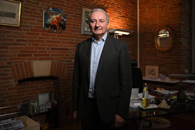 Toulouse's Mayor Jean-Luc Moudenc of Les Republicains (LR) party, poses in his office during a photo session in Toulouse, south-western France on December 10, 2025. (Photo by Valentine CHAPUIS / AFP)