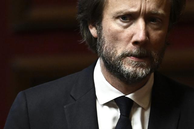 President of Socialistes et Apparentes parliamentary group Boris Vallaud attends a session of questions to the government at the National Assembly, France's lower house parliament, in Paris on December 10, 2025. (Photo by JULIEN DE ROSA / AFP)