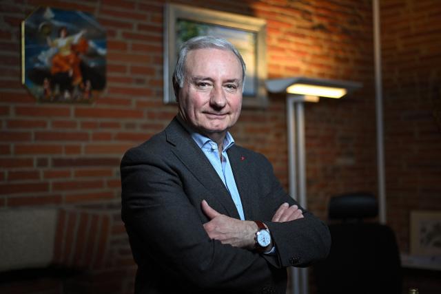 Toulouse's Mayor Jean-Luc Moudenc of Les Republicains (LR) party, poses in his office during a photo session in Toulouse, south-western France on December 10, 2025. (Photo by Valentine CHAPUIS / AFP)