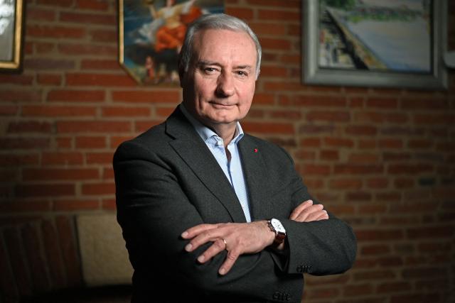 Toulouse's Mayor Jean-Luc Moudenc of Les Republicains (LR) party, poses in his office during a photo session in Toulouse, south-western France on December 10, 2025. (Photo by Valentine CHAPUIS / AFP)