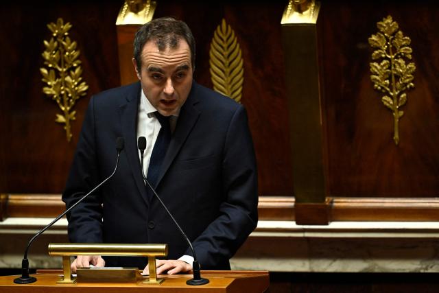 France's Prime Minister Sebastien Lecornu speaks during a government statement on national defence strategy at the National Assembly, France's lower house parliament, in Paris on December 10, 2025. (Photo by JULIEN DE ROSA / AFP)