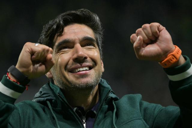 (FILES) Palmeiras' Portuguese coach Abel Ferreira celebrates after winning the Copa Libertadores semifinal second leg football match between Brazil's Palmeiras and Ecuador's Liga de Quito at the Allianz Parque stadium in Sao Paulo, Brazil, on October 30, 2025. Brazil's club Palmeiras announced on December 10, 2025 that it had renewed its contract with Portuguese coach Abel Ferreira until December 2027, despite a season without titles in which it was beaten by Flamengo in the Libertadores final and in the Brasileirao. (Photo by Nelson ALMEIDA / AFP)