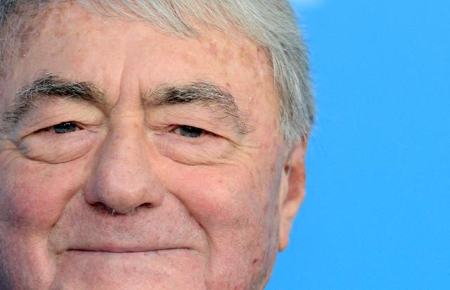 (FILES) French documentary filmmaker and producer Claude Lanzmann gestures during a photocall organised for his honorary Golden Bear, on February 14, 2013, during the 63rd Berlinale Film Festival in Berlin. Forty years after the release of Claude Lanzmann's “Shoah,” a making-of film and an exhibition of audio recordings shed light on the genesis of this “monumental film” about the systematic extermination of Jews by the Nazis. (Photo by GERARD JULIEN / AFP)