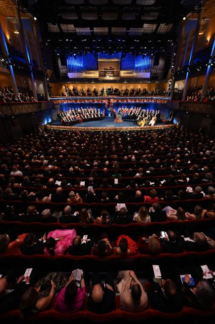 Laureates and guests attend the Nobel award ceremony at the Concert Hall in Stockholm, Sweden on December 10, 2025. The laureates received their prizes at formal ceremonies in Stockholm and Oslo on December 10. That date is the anniversary of the death in 1896 of scientist Alfred Nobel, who created the prizes in his will. (Photo by Jonathan Nackstrand / AFP)