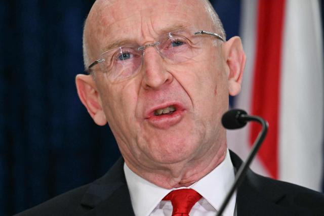 Britain's Defence Secretary John Healey delivers remarks during the annual AUKUS Defense Ministers' Ministerial with US Secretary of Defense Pete Hegseth and Australian Deputy Prime Minister and Defense Minister Richard Marles at the Pentagon in Washington, DC, on December 10, 2025. (Photo by Jim WATSON / AFP)