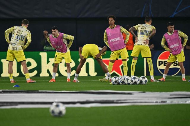 Villarreal's players warm up prior the UEFA Champions League league phase day 6 football match between Villarreal CF and FC Copenhagen at La Ceramica Stadium in Vila-real on December 10, 2025. (Photo by JOSE JORDAN / AFP)