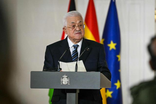 President of the Palestinian Authority Mahmoud Abbas delivers remarks following his meeting with Sanish Prime Minister Pedro Sanchez at the Moncloa Palace in Madrid on December 12, 2025. (Photo by Javier SORIANO / AFP)