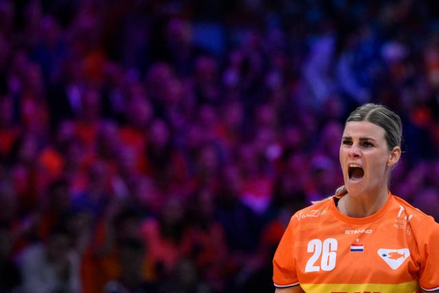 Netherlands' right wing #26 Angela Malestein celebrates after scoring during the quarter finals match between the Netherlands and Hungary of the IHF Women's Handball World Championship in Rotterdam Ahoy, in Rotterdam on December 10, 2025. (Photo by JOHN THYS / AFP)