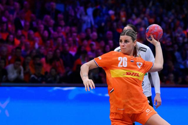 Netherlands' right wing #26 Angela Malestein shoots to score during the quarter finals match between the Netherlands and Hungary of the IHF Women's Handball World Championship in Rotterdam Ahoy, in Rotterdam on December 10, 2025. (Photo by JOHN THYS / AFP)