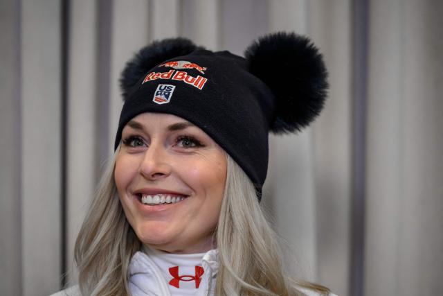 US Lindsey Vonn smiles during a press conference ahead of speed ski races as part of the FIS Alpine ski World Cup 2025-2026, in St. Moritz on December 10, 2025. (Photo by Fabrice COFFRINI / AFP)