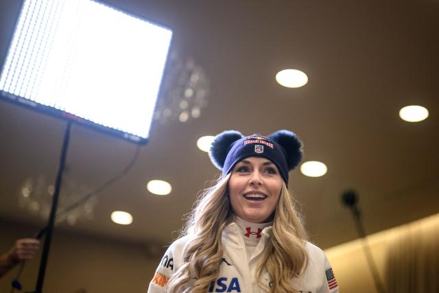 US Lindsey Vonn arrives to hold a press conference ahead of speed skiing races as part of the FIS Alpine ski World Cup 2025-2026, in St. Moritz on December 10, 2025. (Photo by Fabrice COFFRINI / AFP)