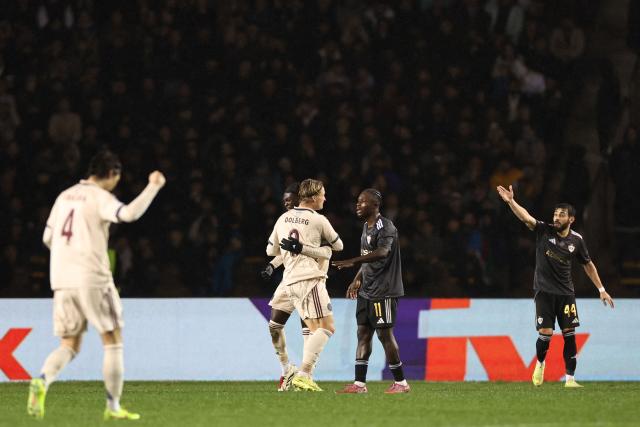 Ajax's Danish forward #09 Kasper Dolberg celebrates after scoring the team's first goal during the UEFA Champions League league phase football match between Qarabag and Ajax at the Tofiq Bahramov Republican Stadium in Baku on December 10, 2025. (Photo by Giorgi ARJEVANIDZE / AFP)