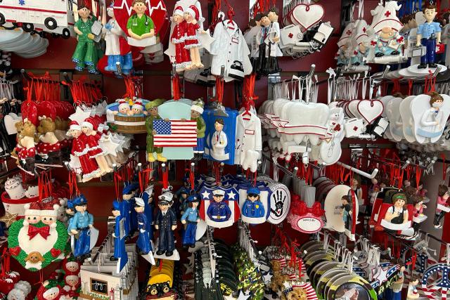 Christmas tree ornaments are displayed for sale at the Westfield Mall in Annapolis, Maryland, on December 10, 2025. (Photo by Jim WATSON / AFP)