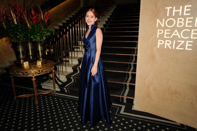 Ana Corina Sosa, the daughter of Venezuelan opposition leader and laureate of the Nobel Peace Prize Maria Corina Machado (unseen) arrives for the Nobel Peace Award banquet at the Grand Hotel in Oslo, Norway, on December 10, 2025. The 2025 Nobel Peace Prize was awarded to Maria Corina Machado for her efforts to bring democracy to Venezuela, challenging the iron-fisted rule of Venezuelan President Nicolas Maduro, who has been president since 2013. Her daughter Maria Corina Machado had accepted the prize in her absence in Oslo. (Photo by Lise Åserud / NTB / AFP) / Norway OUT