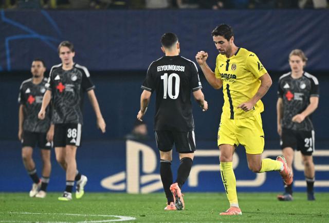 Villarreal's Spanish midfielder #14 Santi Comesana celebrates scoring his team's first goal during the UEFA Champions League league phase day 6 football match between Villarreal CF and FC Copenhagen at La Ceramica Stadium in Vila-real on December 10, 2025. (Photo by JOSE JORDAN / AFP)