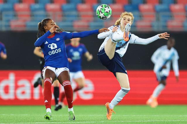 Valerenga's Norwegian forward #14 Mawa Sesay (L) and Paris FC's French defender #02 Celina Ould Hocine vie for the ball during the Women's UEFA Champions League league phase day five football match between Valerenga and Paris FC at Intility Arena in Oslo, Norway, on December 10, 2025. (Photo by Thomas Andersen / NTB / AFP) / Norway OUT