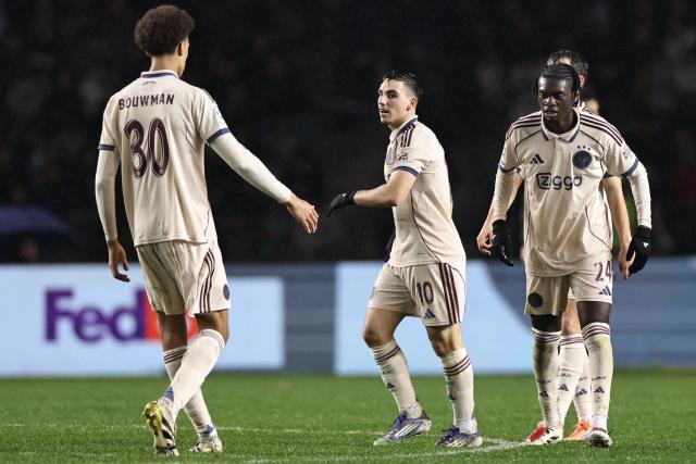 Ajax's Israeli midfielder #10 Oscar Gloukh celebrates after scoring the team's second goal during the UEFA Champions League league phase football match between Qarabag and Ajax at the Tofiq Bahramov Republican Stadium in Baku on December 10, 2025. (Photo by Giorgi ARJEVANIDZE / AFP)