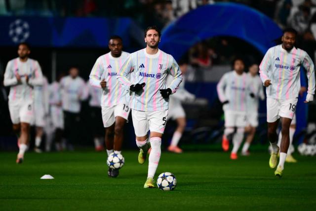 Juventus' Italian midfielder #05 Manuel Locatelli warms up with teammates before the UEFA Champions League - league phase day 6 football match between Juventus and Pafos FC at the Allianz stadium in Turin, on December 10, 2025. (Photo by Marco BERTORELLO / AFP)