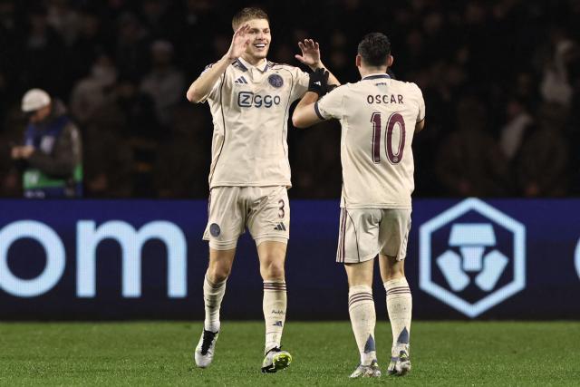 Ajax's Danish defender #03 Anton Gaaei celebrates after scoring the team's third goal during the UEFA Champions League league phase football match between Qarabag and Ajax at the Tofiq Bahramov Republican Stadium in Baku on December 10, 2025. (Photo by Giorgi ARJEVANIDZE / AFP)
