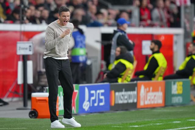 Bayer Leverkusen's Dutch assistant coach Rogier Meijer reacts during the UEFA Champions League league phase - matchday 6, football match between Bayer Leverkusen and Newcastle United FC at the BayArena stadium in Leverkusen, western Germany on December 10, 2025. (Photo by Pau Barrena / AFP)