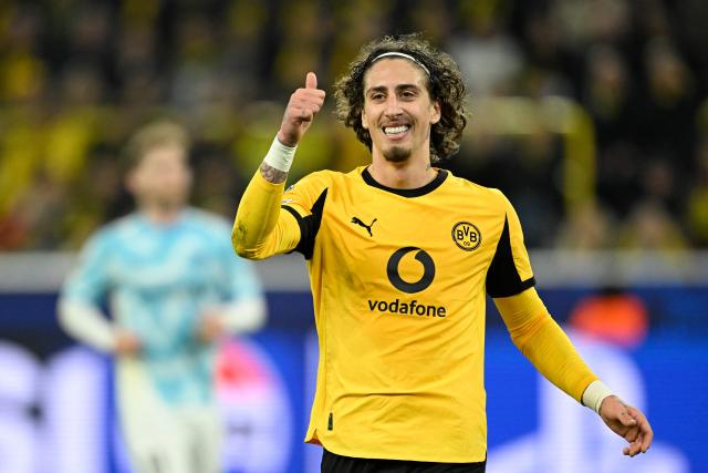 Dortmund's Portuguese forward #21 Fabio Silva gestures during the UEFA Champions League league phase day 6 football match between Borussia Dortmund and Bodoe/Glimt in Dortmund, western Germany, on December 10, 2025. (Photo by INA FASSBENDER / AFP)