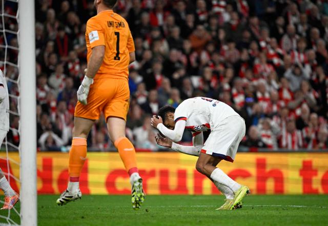 Paris Saint-Germain's French midfielder #24 Senny Mayulu reacts during the UEFA Champions League league phase day 6 football match between Athletic Club Bilbao and Paris Saint-Germain (PSG) at San Mames Stadium in Bilbao on December 10, 2025. (Photo by ANDER GILLENEA / AFP)