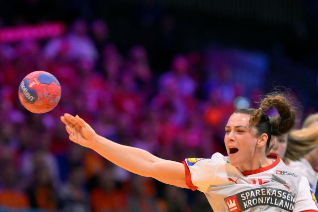 TOPSHOT - Denmark's pivot #15 Sofie Bardrum-Larsen shoots during the quarter finals match between Denmark and France of the IHF Women's Handball World Championship in Rotterdam Ahoy, in Rotterdam on December 10, 2025. (Photo by JOHN THYS / AFP)