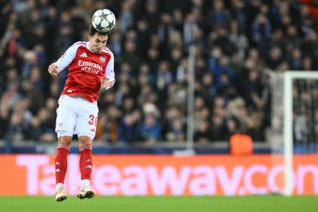 Arsenal's Spanish midfielder #36 Martin Zubimendi heads the ball during the UEFA Champions League, league phase - matchday 6, football match between Club Brugge and Arsenal at the Jan Breydel stadium in Bruges on December 10, 2025. (Photo by NICOLAS TUCAT / AFP)