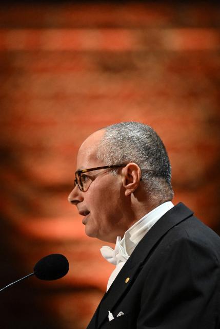 Nobel Prize in Chemistry 2025 laureate US-Jordanian chemist Omar M Yaghi addresses a speech at the end of the Nobel Prize banquet on December 10, 2025 at the City Hall in Stockholm, Sweden. The laureates received their prizes at formal ceremonies in Stockholm and Oslo on December 10. That date is the anniversary of the death in 1896 of scientist Alfred Nobel, who created the prizes in his will. (Photo by Jonathan Nackstrand / AFP)