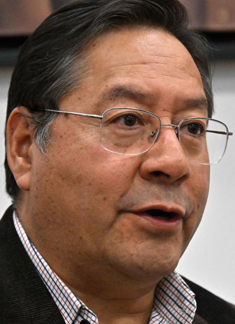 (FILES) Bolivia's President Luis Arce Catacora speaks during an interview with AFP at the Casa Grande del Pueblo in La Paz on June 18, 2025. Bolivia's former president Luis Arce was arrested on December 10, 2025, by police officers in La Paz after prosecutors launched an investigation into an alleged corruption case dating back to his time as minister under former president Evo Morales (2006-2019), the government said. (Photo by AIZAR RALDES / AFP)