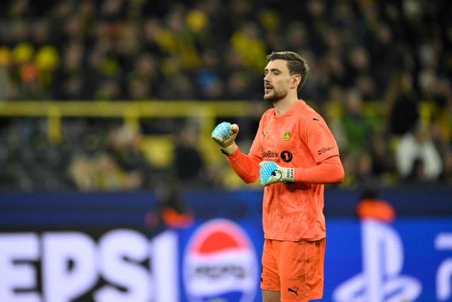 Bodoe/Glimt's Russian goalkeeper #12 Nikita Haikin reacts after the end of the UEFA Champions League league phase day 6 football match between Borussia Dortmund and Bodoe/Glimt in Dortmund, western Germany, on December 10, 2025. (Photo by INA FASSBENDER / AFP)
