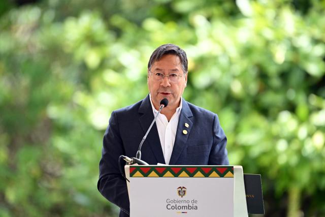 (FILES) Bolivia's President Luis Arce Catacora speaks during the Amazon Cooperation Treaty Organization (OTCA) Summit in Bogota on August 22, 2025. Bolivia's former president Luis Arce was arrested on December 10, 2025, by police officers in La Paz after prosecutors launched an investigation into an alleged corruption case dating back to his time as minister under former president Evo Morales (2006-2019), the government said. (Photo by RAUL ARBOLEDA / AFP)