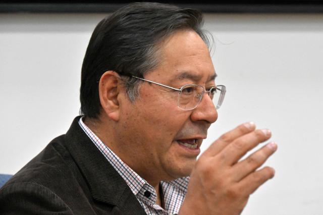 (FILES) Bolivia's President Luis Arce Catacora speaks during an interview with AFP at the Casa Grande del Pueblo in La Paz on June 18, 2025. Bolivia's former president Luis Arce was arrested on December 10, 2025, by police officers in La Paz after prosecutors launched an investigation into an alleged corruption case dating back to his time as minister under former president Evo Morales (2006-2019), the government said. (Photo by AIZAR RALDES / AFP)