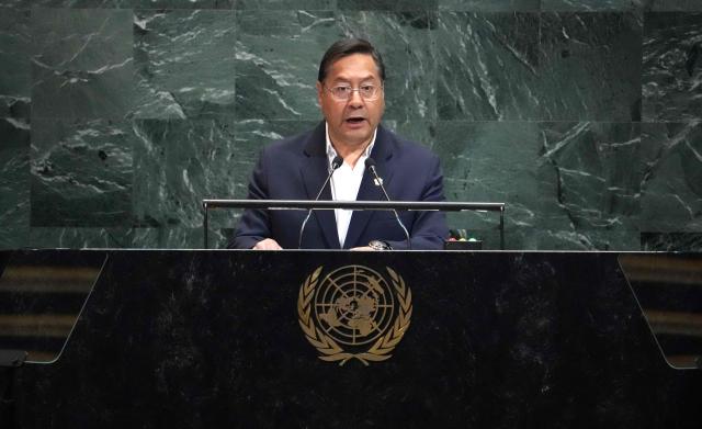 (FILES) Bolivia's President Luis Arce Catacora speaks during the General Debate of the United Nations General Assembly at UN headquarters in New York City on September 25, 2025. Bolivia's former president Luis Arce was arrested on December 10, 2025, by police officers in La Paz after prosecutors launched an investigation into an alleged corruption case dating back to his time as minister under former president Evo Morales (2006-2019), the government said. (Photo by TIMOTHY A. CLARY / AFP)