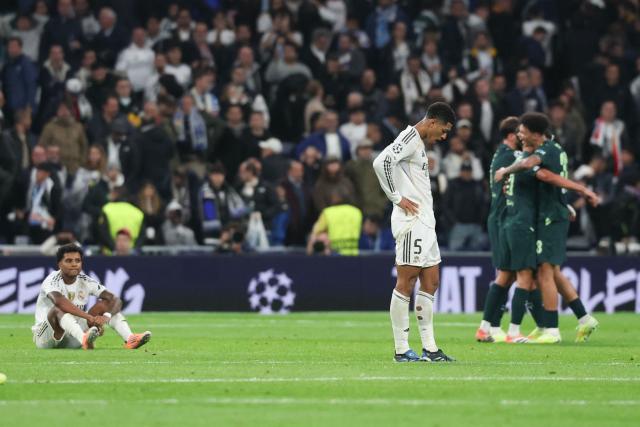 Real Madrid's English midfielder #05 Jude Bellingham reacts after the UEFA Champions League league phase day 6 football match between Real Madrid CF and Manchester City at Santiago Bernabeu Stadium in Madrid on December 10, 2025. (Photo by Pierre-Philippe MARCOU / AFP)