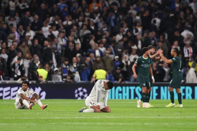 Real Madrid's English midfielder #05 Jude Bellingham reacts after the UEFA Champions League league phase day 6 football match between Real Madrid CF and Manchester City at Santiago Bernabeu Stadium in Madrid on December 10, 2025. (Photo by Pierre-Philippe MARCOU / AFP)