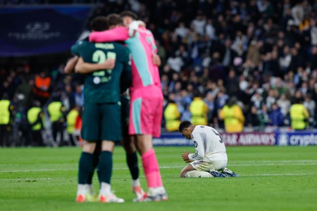 Real Madrid's English midfielder #05 Jude Bellingham reacts after the UEFA Champions League league phase day 6 football match between Real Madrid CF and Manchester City at Santiago Bernabeu Stadium in Madrid on December 10, 2025. (Photo by Oscar DEL POZO / AFP)