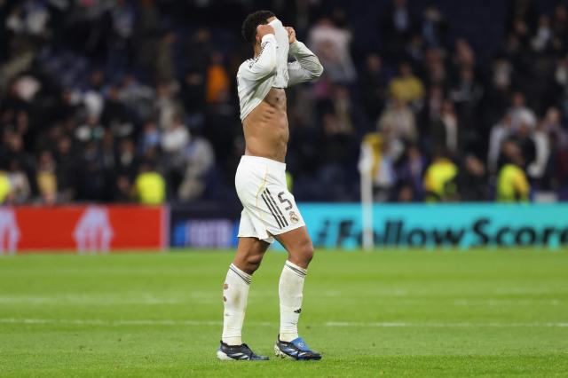 TOPSHOT - Real Madrid's English midfielder #05 Jude Bellingham reacts after the UEFA Champions League league phase day 6 football match between Real Madrid CF and Manchester City at Santiago Bernabeu Stadium in Madrid on December 10, 2025. (Photo by Thomas COEX / AFP)