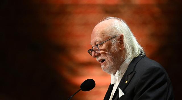 Nobel Prize in Literature 2025 laureate Hungarian writer Laszlo Krasznahorkai addresses a speech at the end of the Nobel Prize banquet on December 10, 2025 at the City Hall in Stockholm, Sweden. The laureates received their prizes at formal ceremonies in Stockholm and Oslo on December 10. That date is the anniversary of the death in 1896 of scientist Alfred Nobel, who created the prizes in his will. (Photo by Jonathan Nackstrand / AFP)