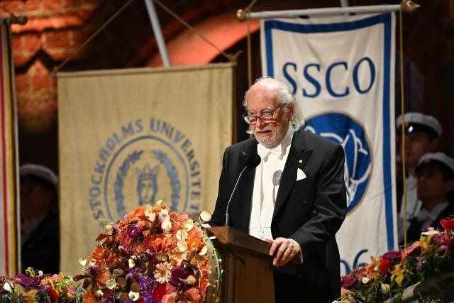 Nobel Prize in Literature 2025 laureate Hungarian writer Laszlo Krasznahorkai addresses a speech at the end of the Nobel Prize banquet on December 10, 2025 at the City Hall in Stockholm, Sweden. The laureates received their prizes at formal ceremonies in Stockholm and Oslo on December 10. That date is the anniversary of the death in 1896 of scientist Alfred Nobel, who created the prizes in his will. (Photo by Jonathan Nackstrand / AFP)