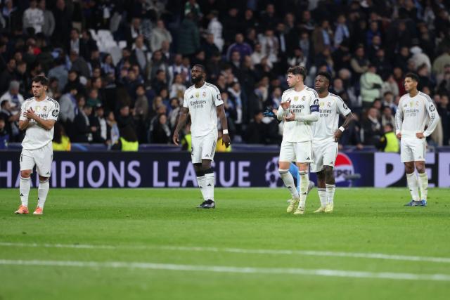 Real Madrid players react after the UEFA Champions League league phase day 6 football match between Real Madrid CF and Manchester City at Santiago Bernabeu Stadium in Madrid on December 10, 2025. (Photo by Thomas COEX / AFP)