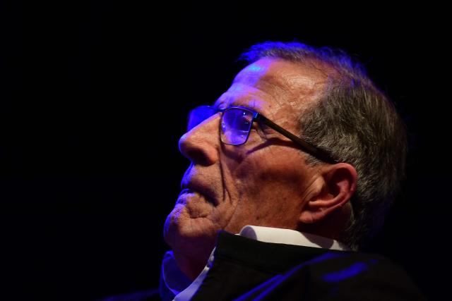 Former Uruguay coach Oscar Washington Tabarez gestures during a tribute to him and his coaching staff at Sala Zitarrosa in Montevideo on December 10, 2025. (Photo by Dante FERNANDEZ / AFP)