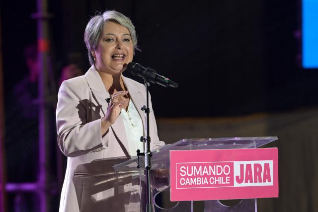 Chile's presidential candidate Jeannette Jara of the Unidad por Chile coalition speaks during her closing campaign rally in Santiago on December 10, 2025. The second round of the Chilean presidential election on December 14 will pit two candidates against each other who are diametrically opposed: Jeannette Jara, the representative of a broad left-wing coalition with modest origins, and the far-right leader Jose Antonio Kast, an ultraconservative Catholic determined to massively expel undocumented migrants. (Photo by Rodrigo ARANGUA / AFP)
