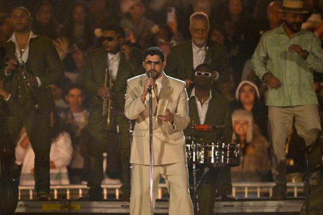 Puerto Rican rapper Bad Bunny performs on stage during his "Debi tirar mas fotos" world tour in Mexico City on December 10, 2025. (Photo by Alfredo ESTRELLA / AFP)